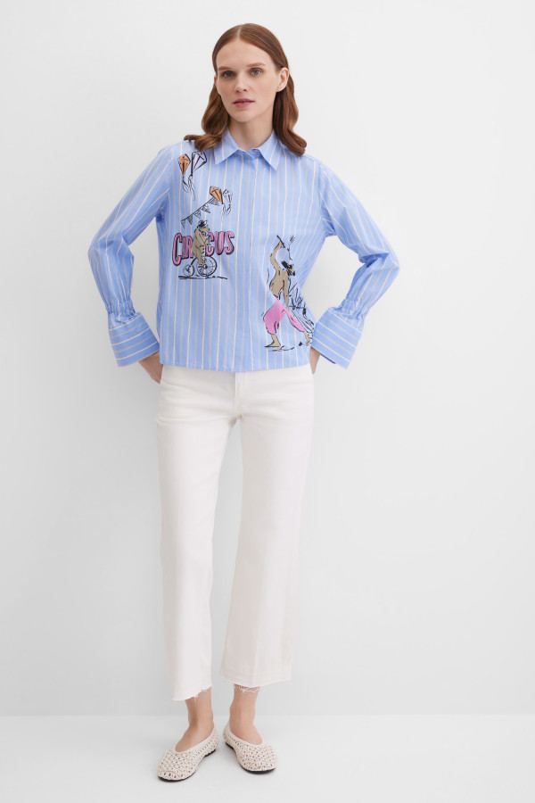 Блузка с широкими манжетами