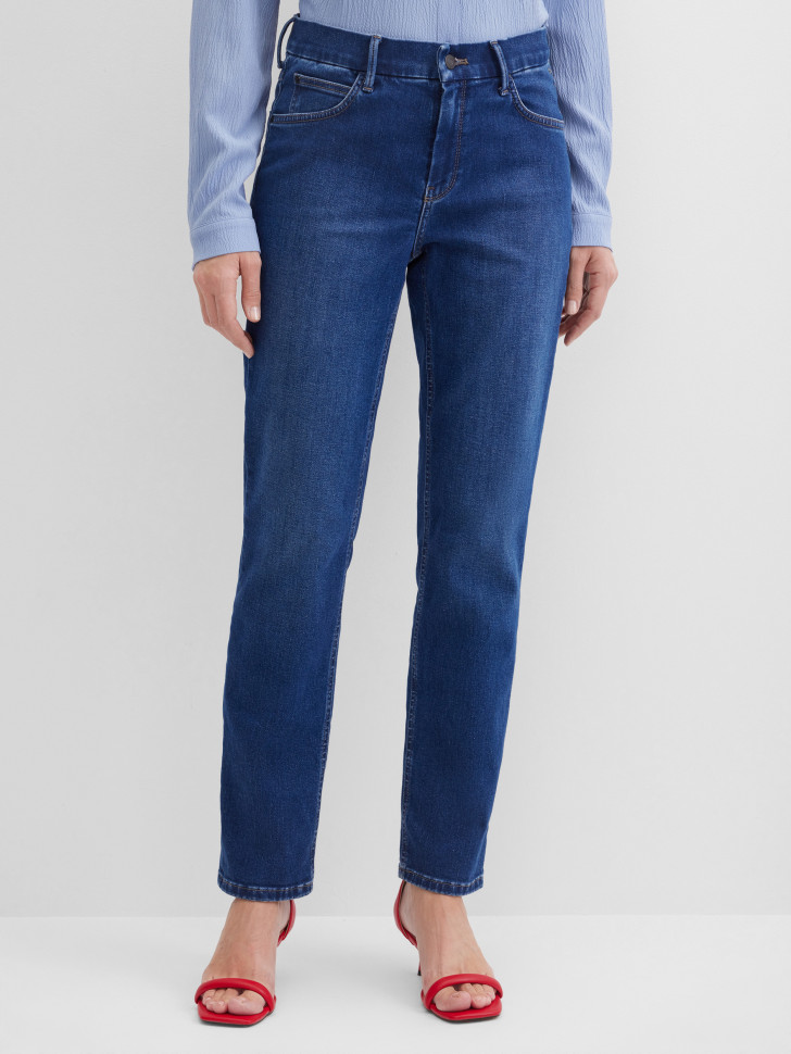 Джинсы зауженные с эффектом потертости