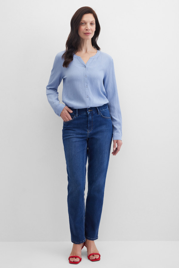 Джинсы зауженные с эффектом потертости