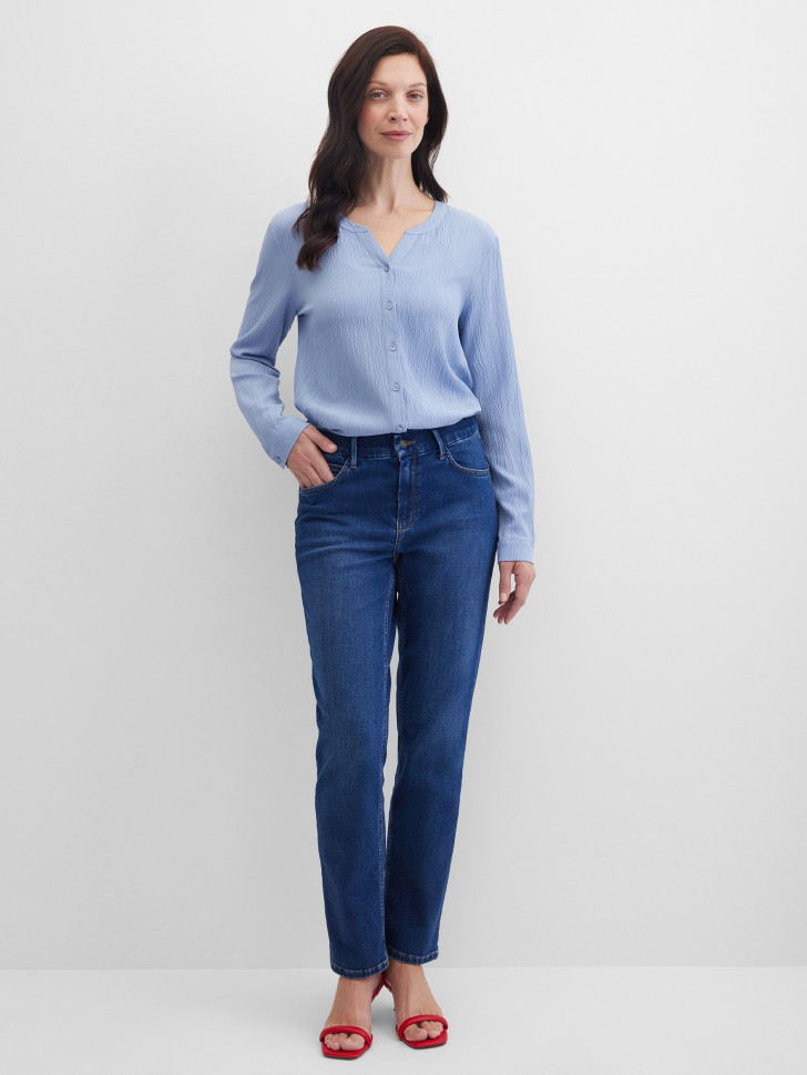 Джинсы зауженные с эффектом потертости