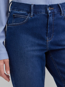 Джинсы зауженные с эффектом потертости