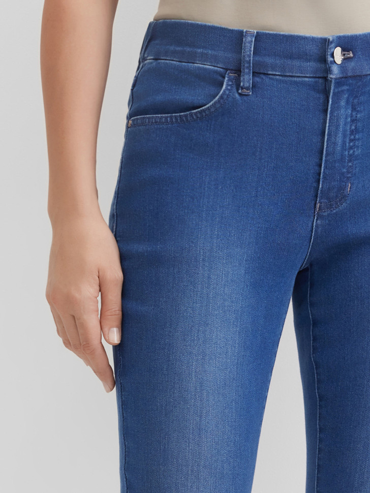 Джинсы зауженные c эффектом потертости