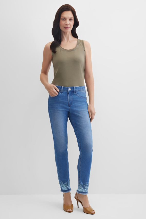 Джинсы зауженные с эффектом потертости