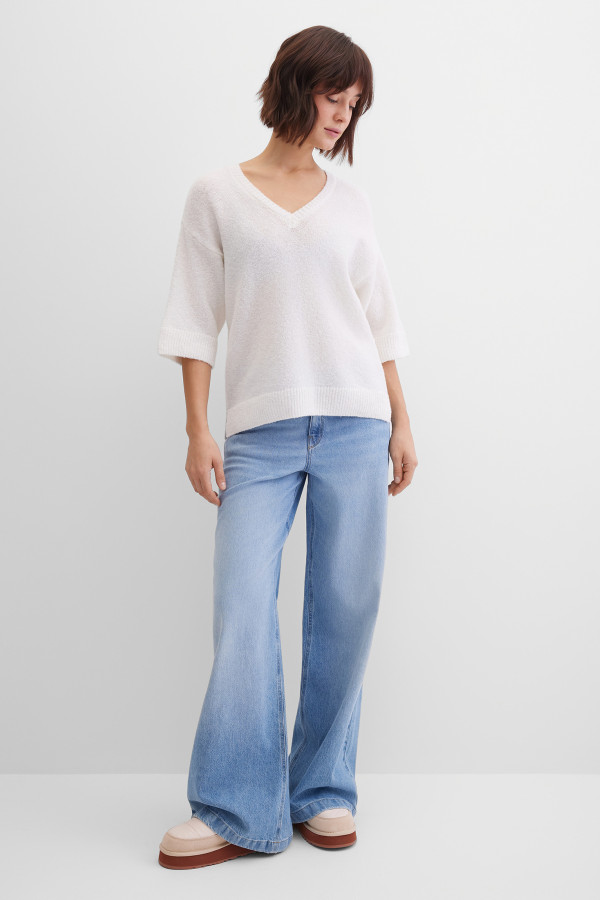 Джинсы клеш широкие