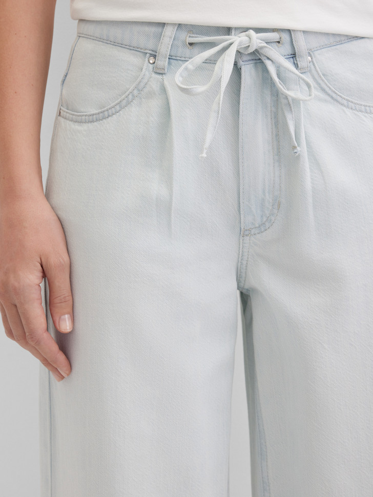 Джинсы широкие