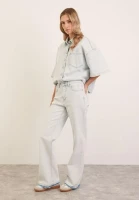 Джинсы клеш