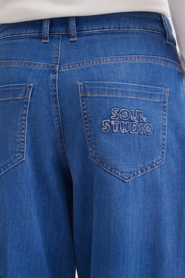 Джинсы бананы