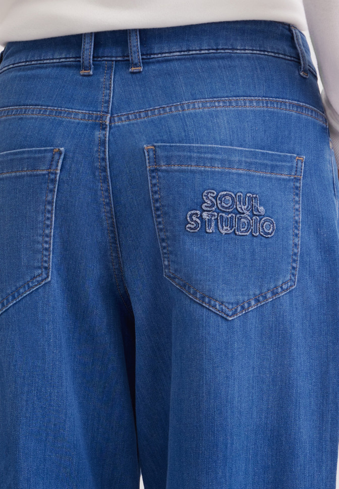 Джинсы бананы